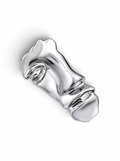 Luna Cotton silver-tone abstract face lapel brooch with a polished molten-metal sculptural design.