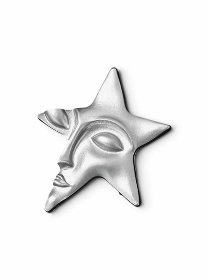 Luna Cotton silver-tone star lapel pin featuring a sculpted human face design with a polished metallic finish.